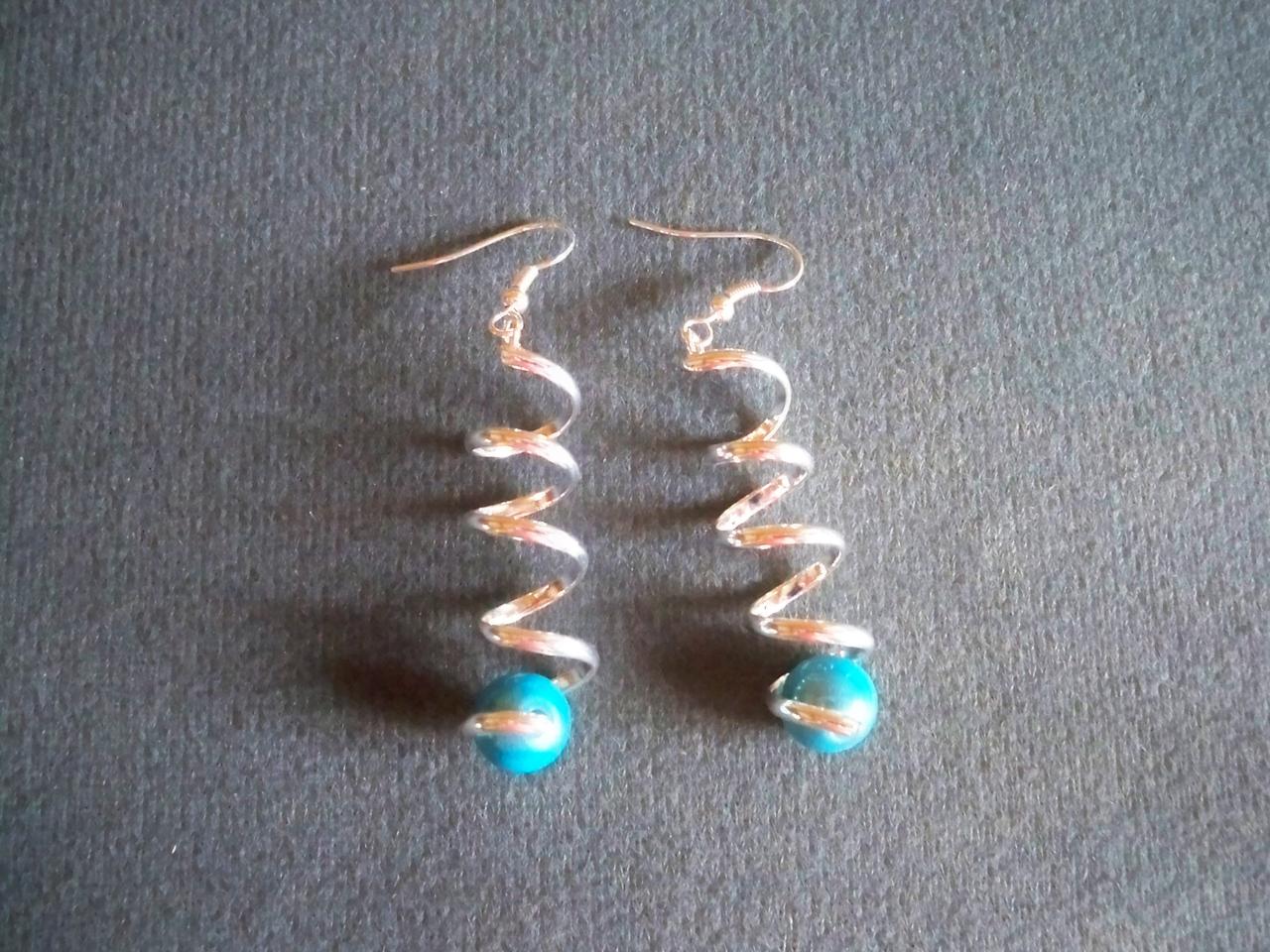 Boucles d'oreilles tortillon argenté et perles magiques turquoise