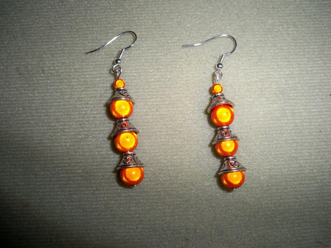 Boucles d'oreilles perles magiques oranges et chapeaux métal