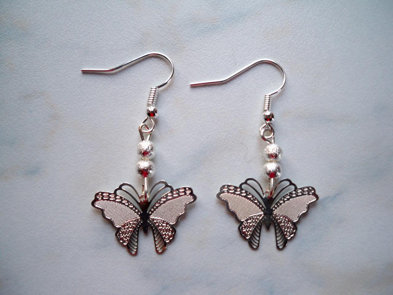 Boucles d'oreilles petit papillon argenté