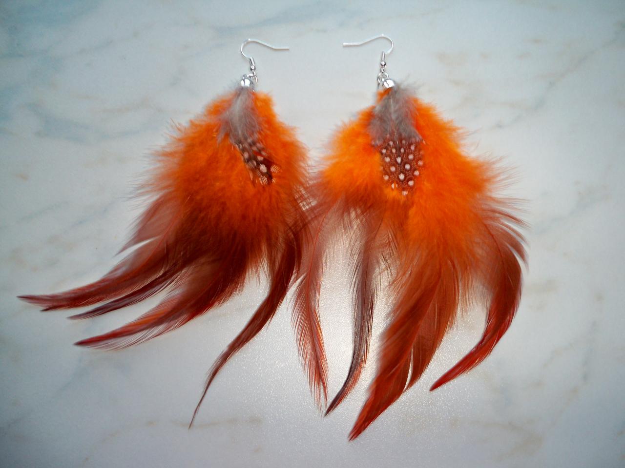 Boucles d'oreilles grandes plumes oranges