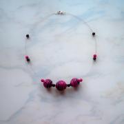 Collier spirale rose bonbon et noir